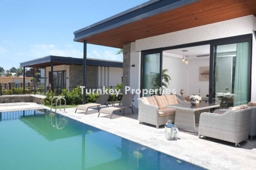 3-Bedroom Detached Villa for Sale in Gumusluk – Luxury Living with Private Beach and Spacious Garden Amidst Nature
